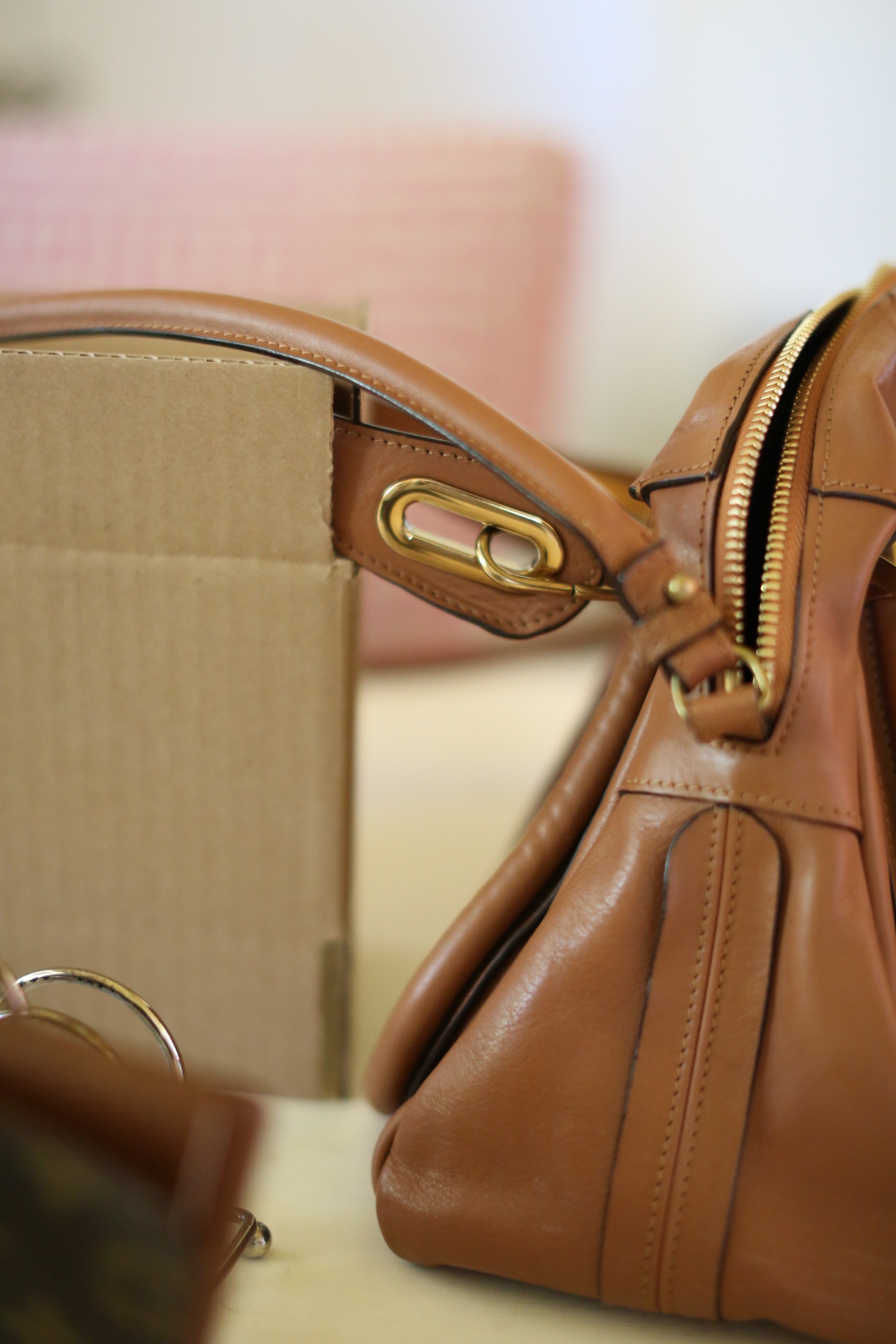 Repairing a leather strap on a handbag | Diana Elizabeth