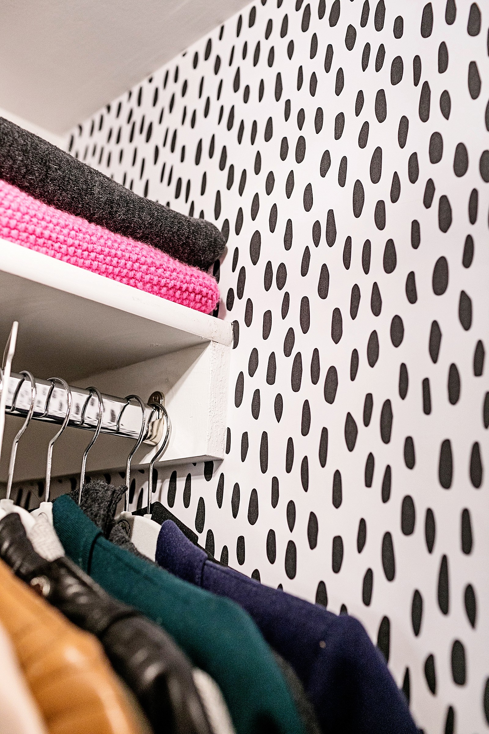 black and white spot Dalmatian look removable wallpaper in small closet
