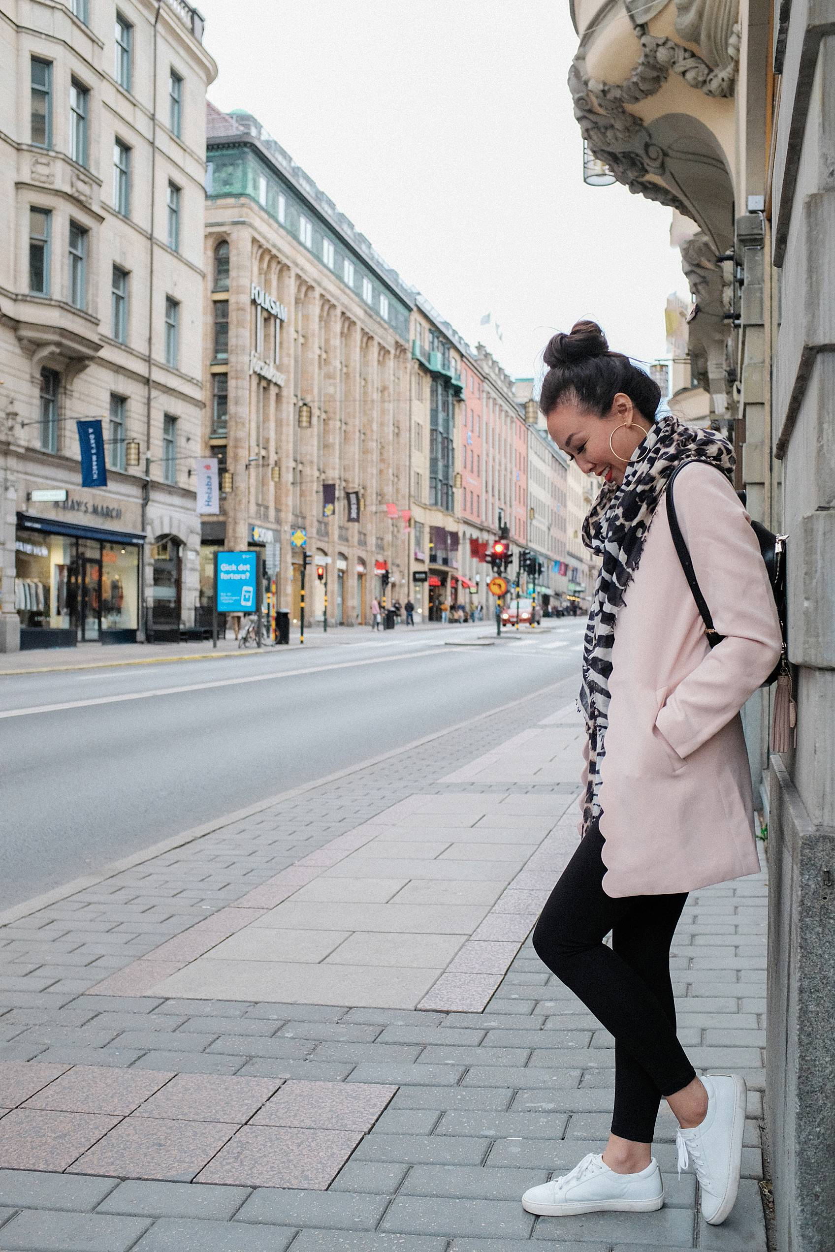 lifestyle travel blogger diana Elizabeth on streets of Stockholm Sweden