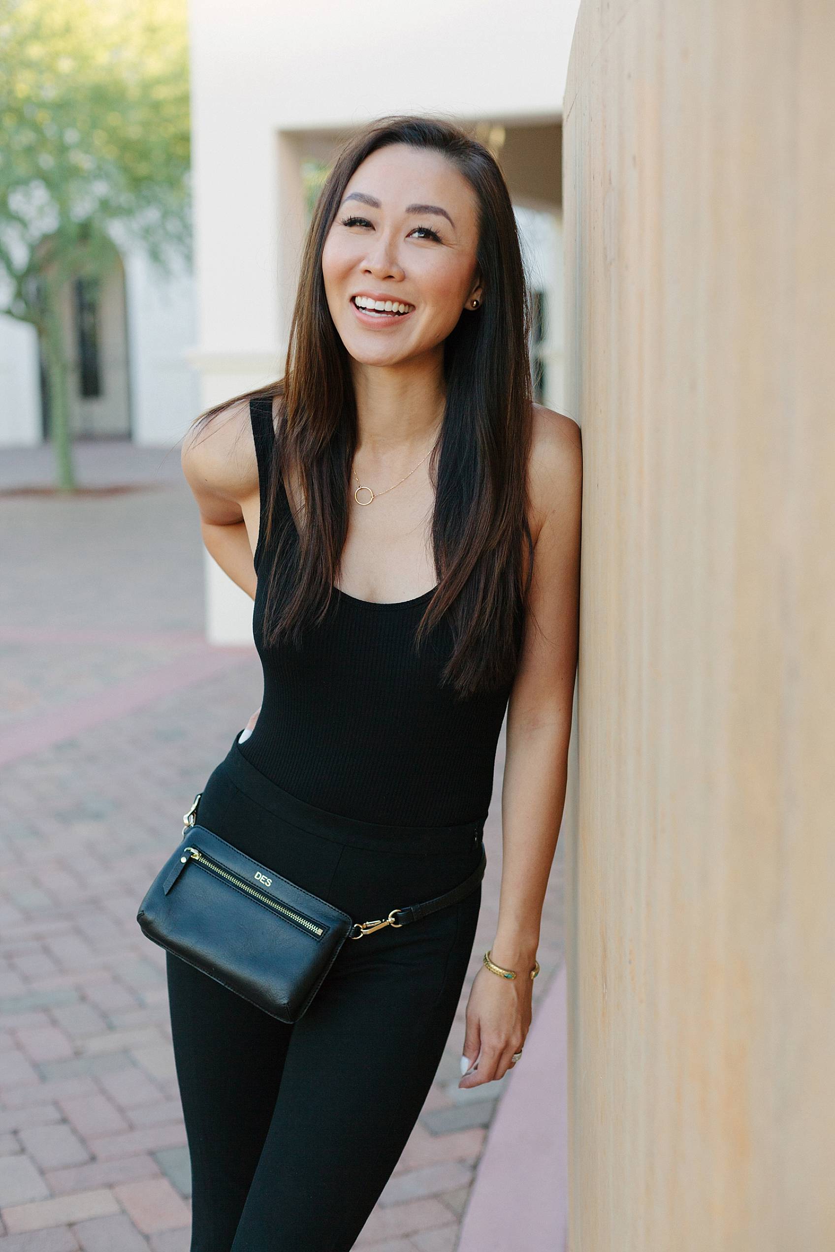 black leather fanny pack outfit wearing all black outfit ideas