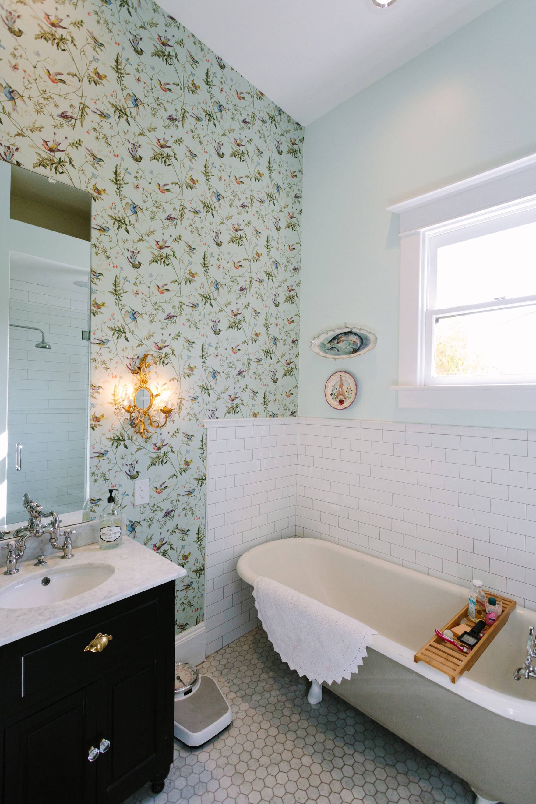 Home Tour of Boho Farm and Home in Downtown Phoenix - cottage brick style home from 1903 bathroom white subway tile and wallpaper French style