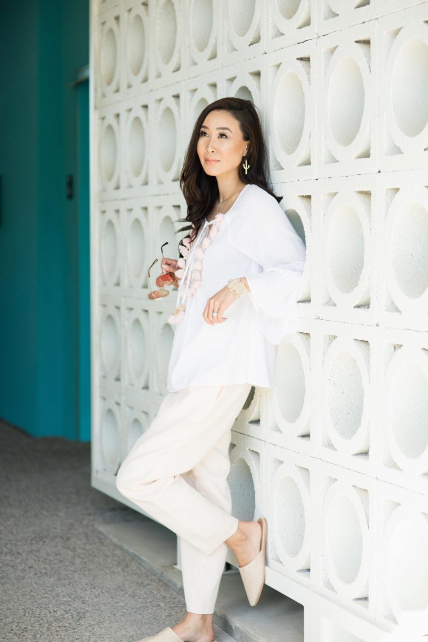 Lilly Pulitzer shandy top white top great for resort wear pink poms