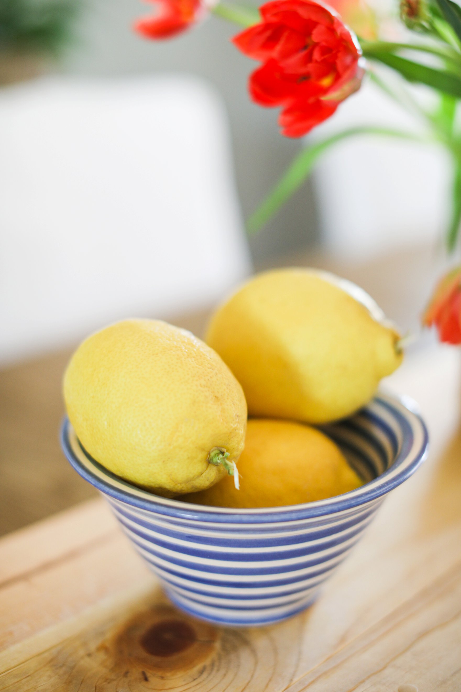 lemons in blue and white stripe bowl from Prague on dining room table