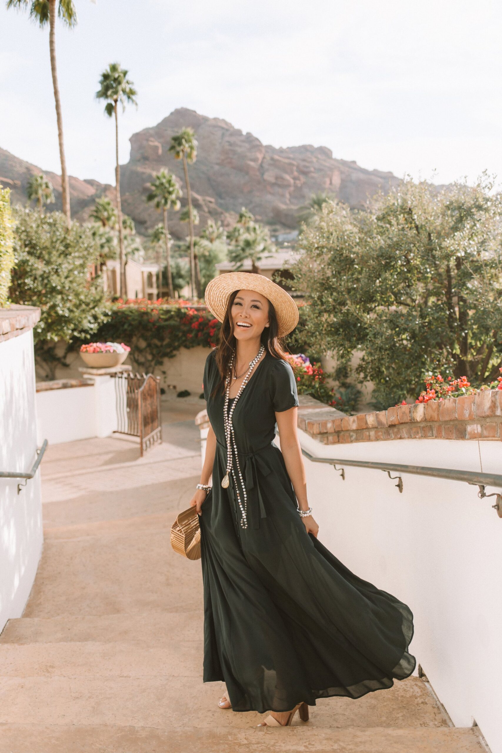 black maxi dress long pearl crochet necklace with hat, sunny day in scottsdale blogger Diana elizabeth