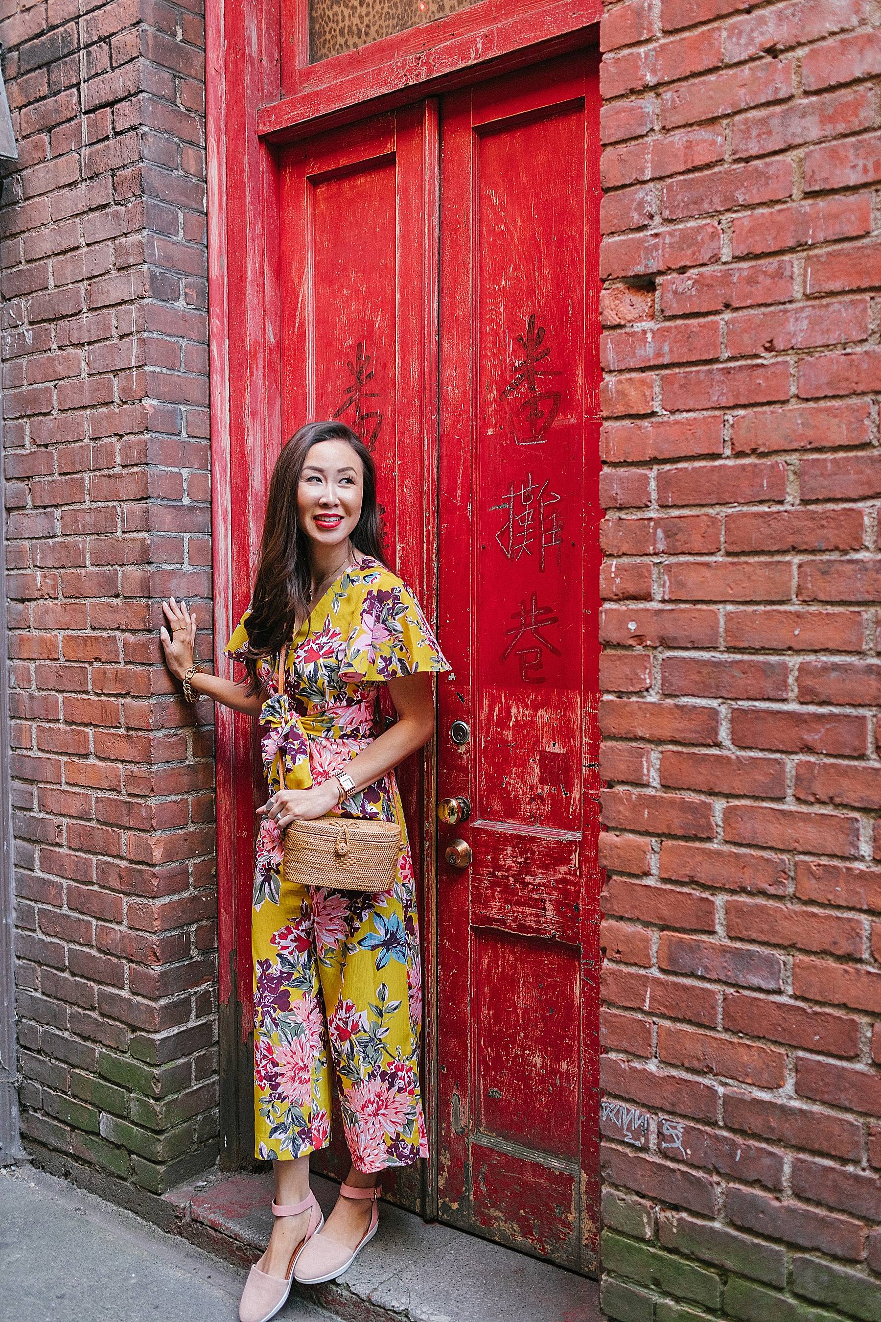 fan tan alley in Victoria Canada chinatown wearing yellow floral jumpsuit by Tahari ASL