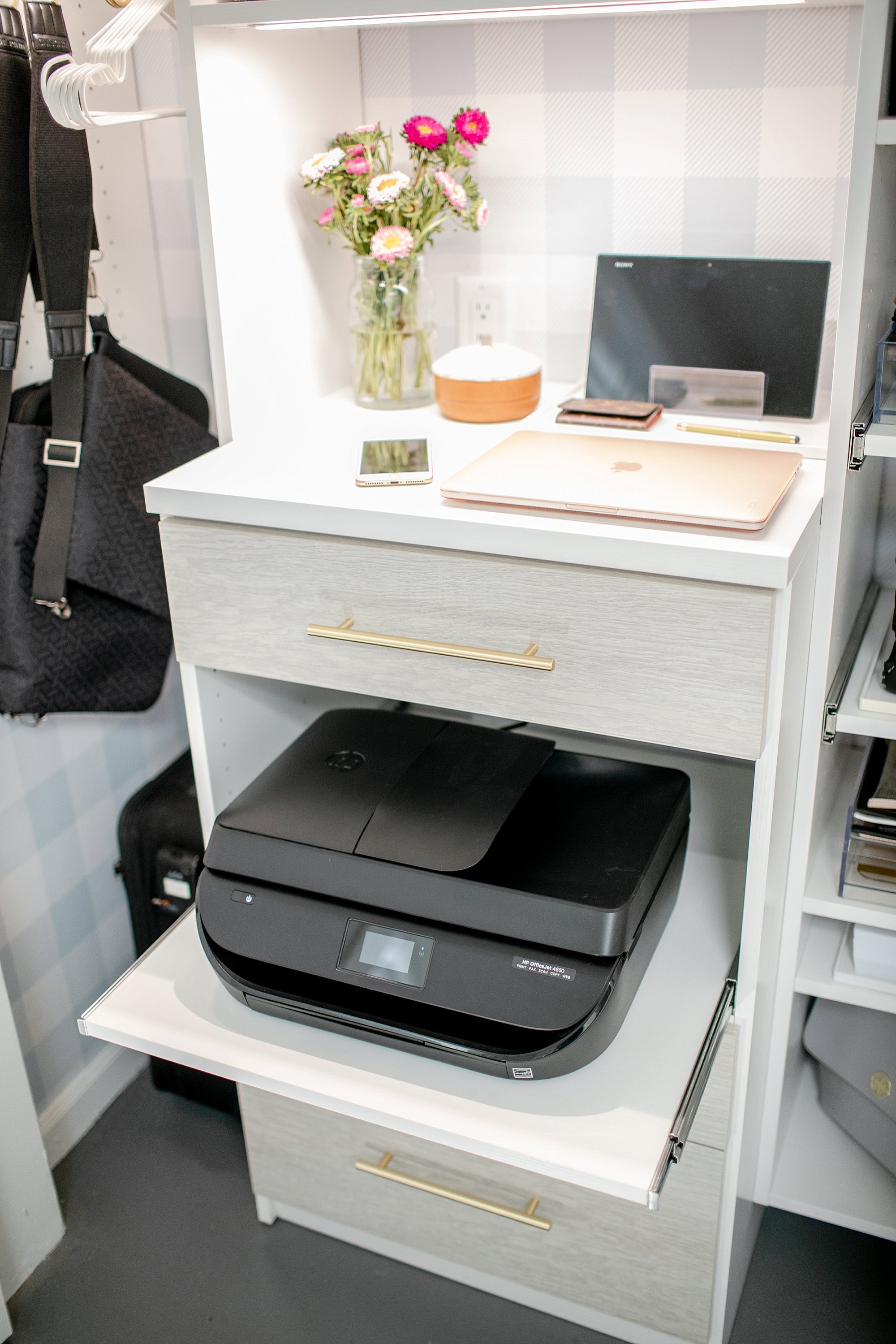 slide out printer in custom office closet: final reveal of office closet reveal belonging to photographer blogger Diana Elizabeth in phoenix arizona. created by California closets and with removable buffalo check wallpaper #office #closet #wallpaper #organization #lensorganization #lensdrawer