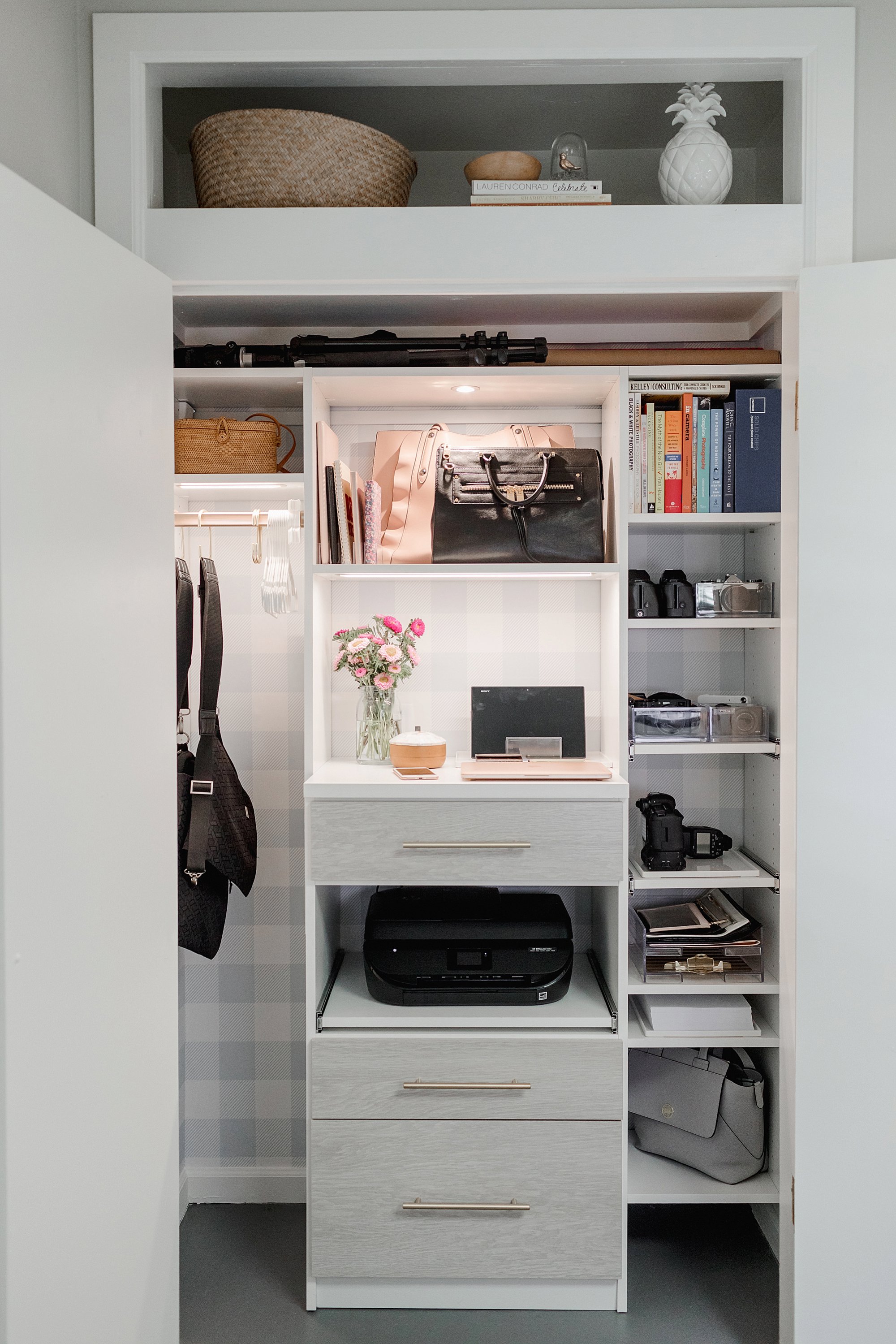 final reveal of office closet reveal belonging to photographer blogger Diana Elizabeth in phoenix arizona. created by California closets and with removable buffalo check wallpaper #office #closet #wallpaper #organization #lensorganization #lensdrawer