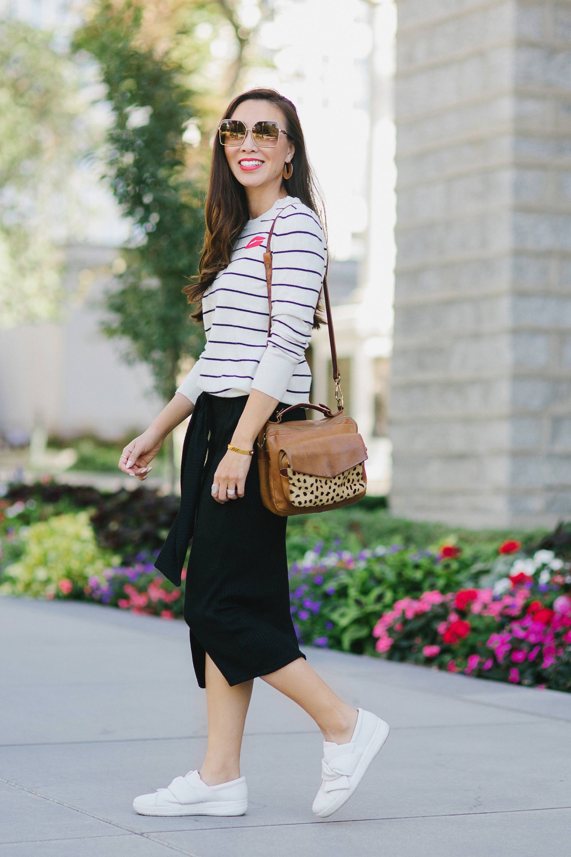 wearing black white stripe sweater banana republic and knit skirt black on lifestyle fashion blogger Diana Elizabeth phoenix arizona and white sneakers