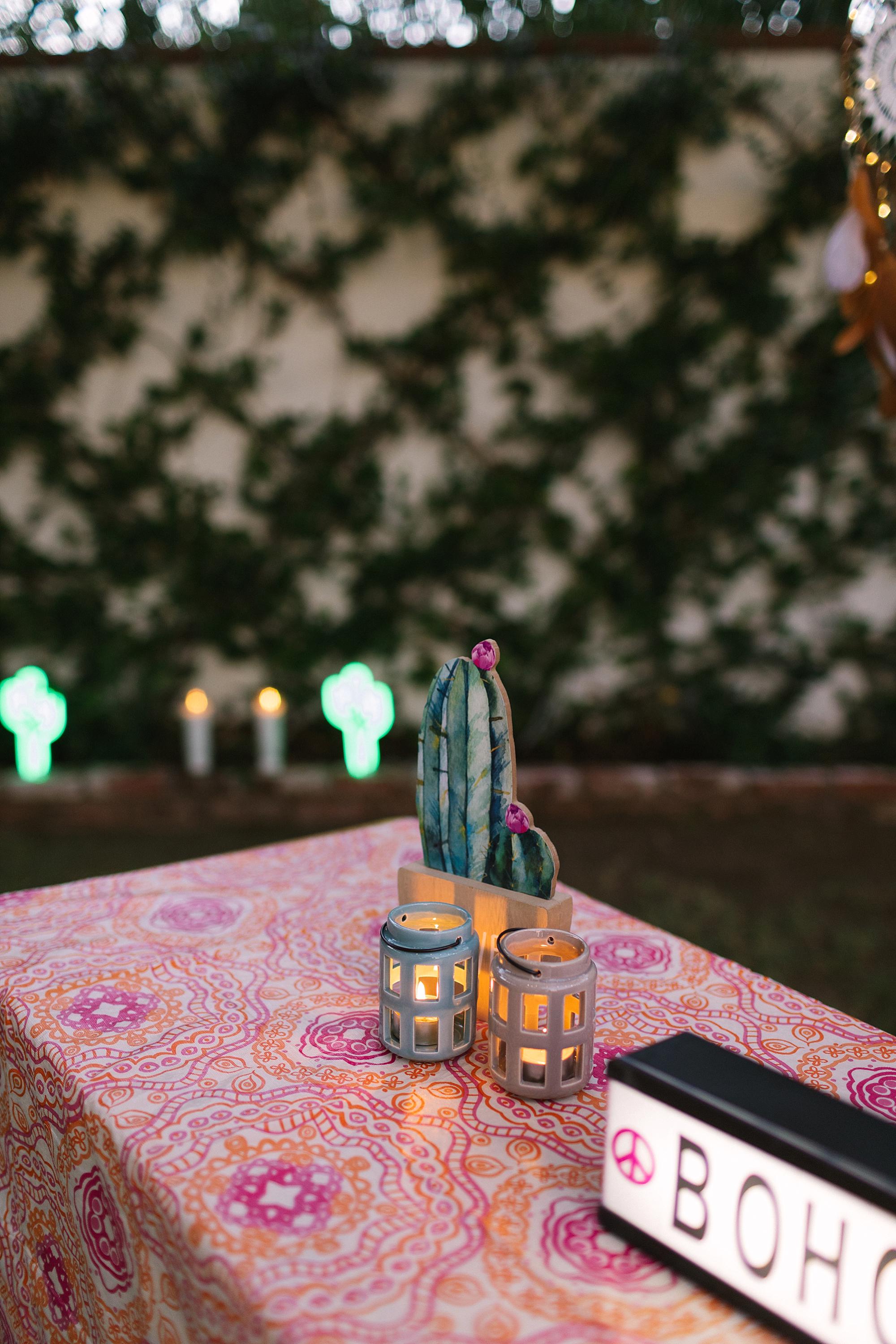 Night time boho theme party with LED light up dream catchers from the 99 only store - check out this party all from the 99 cent store to stay under budget for your party! cactus tealights