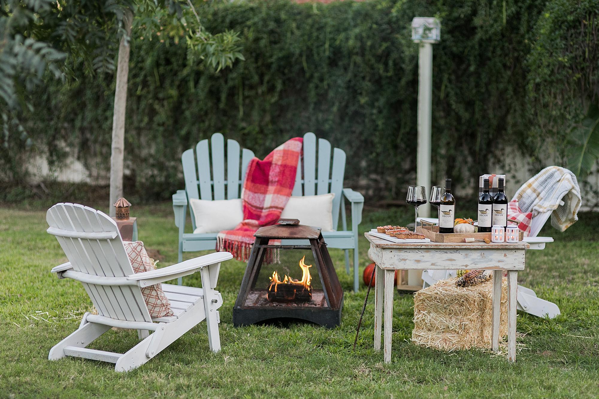 fall backyard gathering party outdoors with decoy wine merlot for October merlot month #wineparty #wine