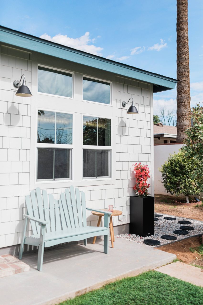 make a rocky drainage path for areas that get muddy by the hose or in the garden - a DIY how too. Alabaster white sherwin Williams white fiber cement shake shingles for siding, restoration hardware lights