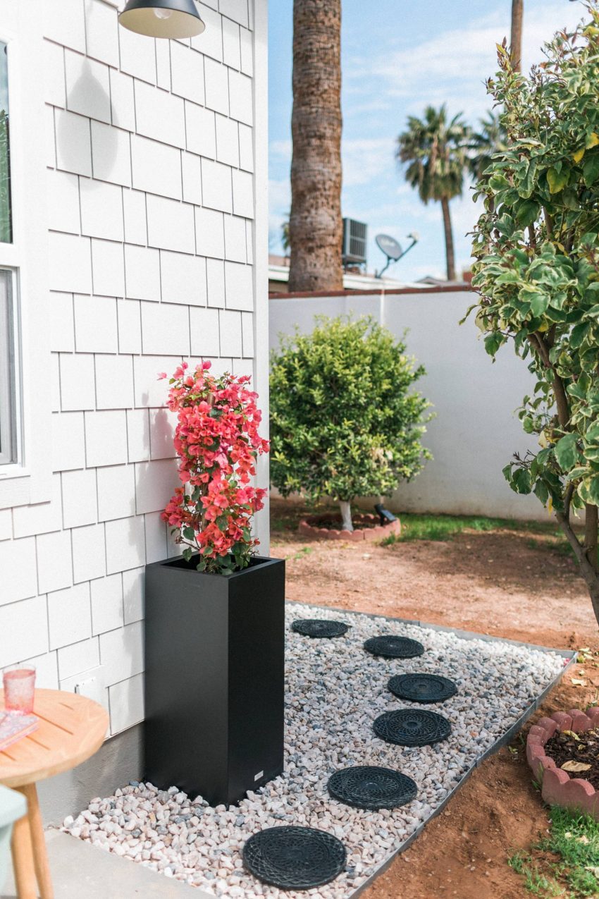 make a rocky drainage path for areas that get muddy by the hose or in the garden - a DIY how too. Alabaster white sherwin Williams white fiber cement shake shingles for siding, restoration hardware lights