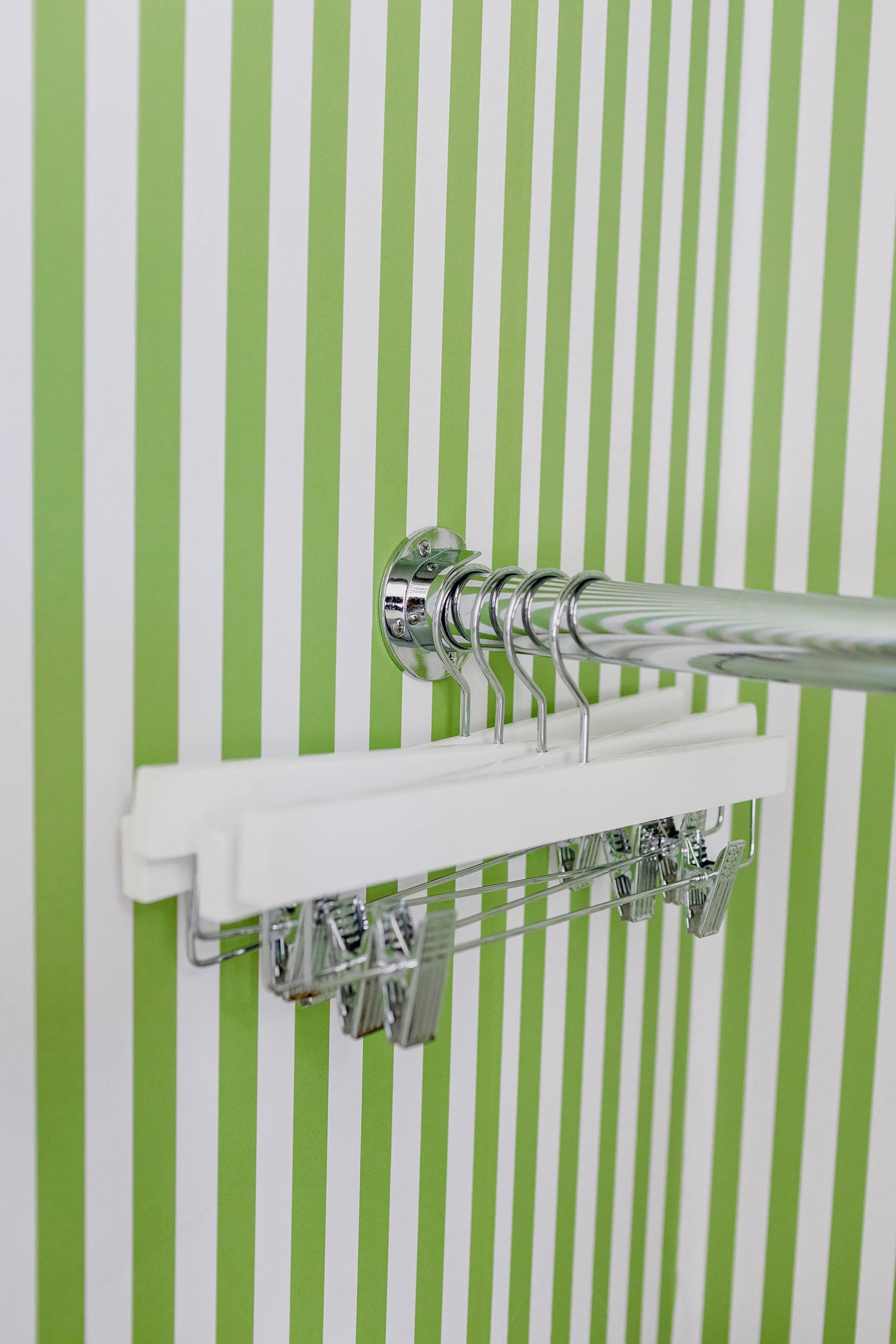 green white stripe wallpapering closet