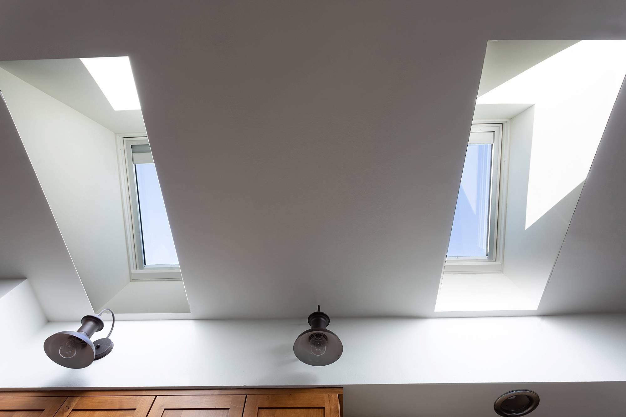 Skylights in the kitchen with VELUX - see before and after photos in this huge blog post