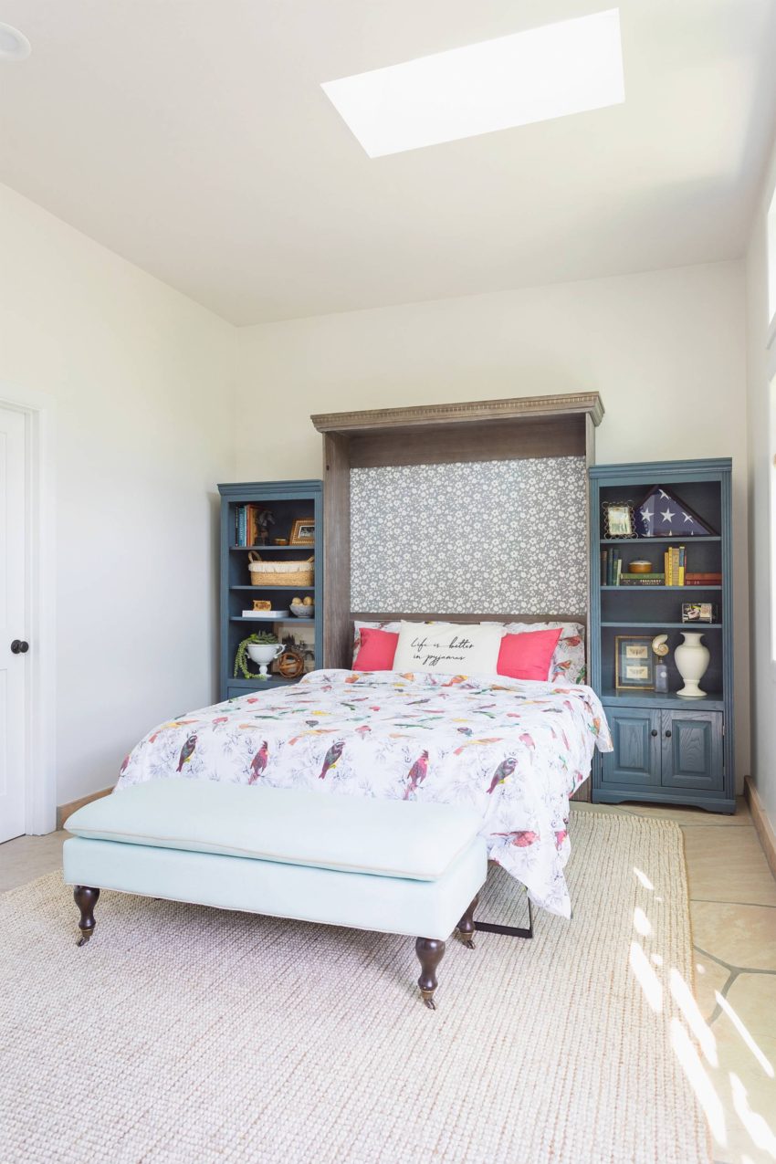how to style and decorate a Murphy bed so it looks attractive try bookshelves