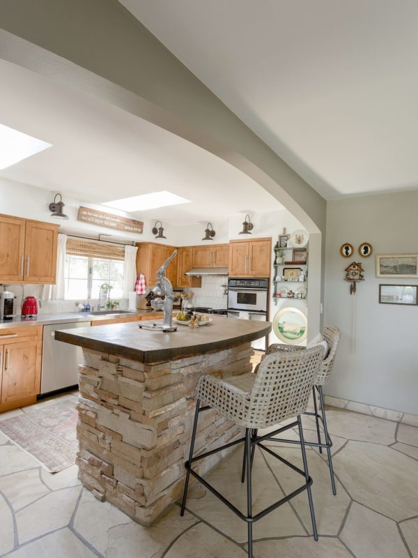 kitchen barstools, flagstone floors, English country cottage style home