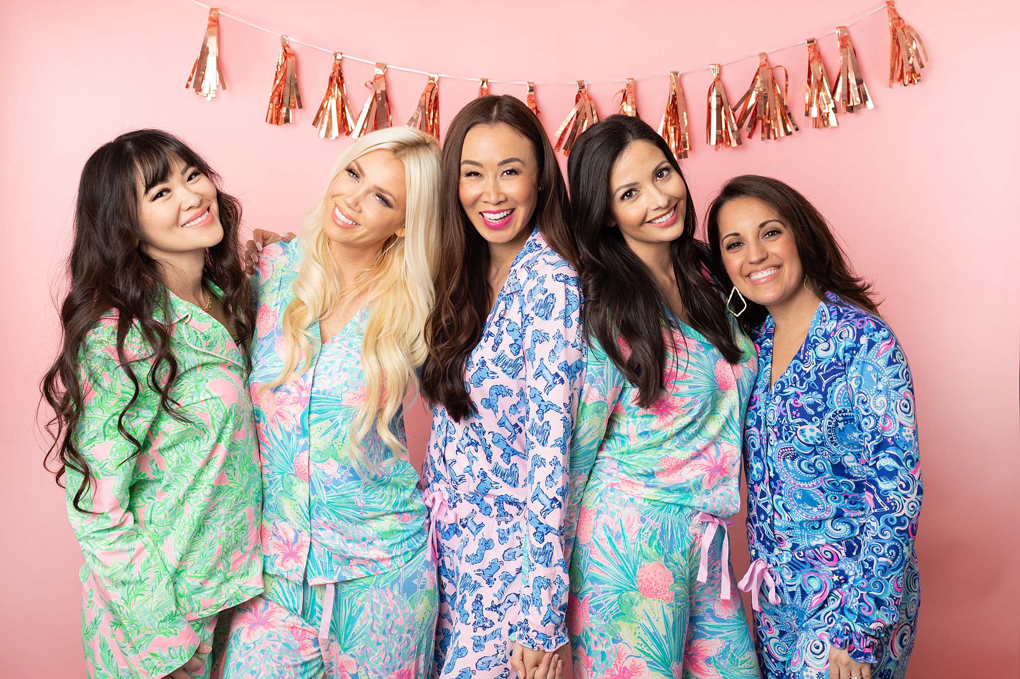 girl gang in front of pink backdrop wearing Lilly Pulitzer pajama for a christmas party - phoenix lifestyle blogger Diana Elizabeth, Christmas girl gang pajama party 2019