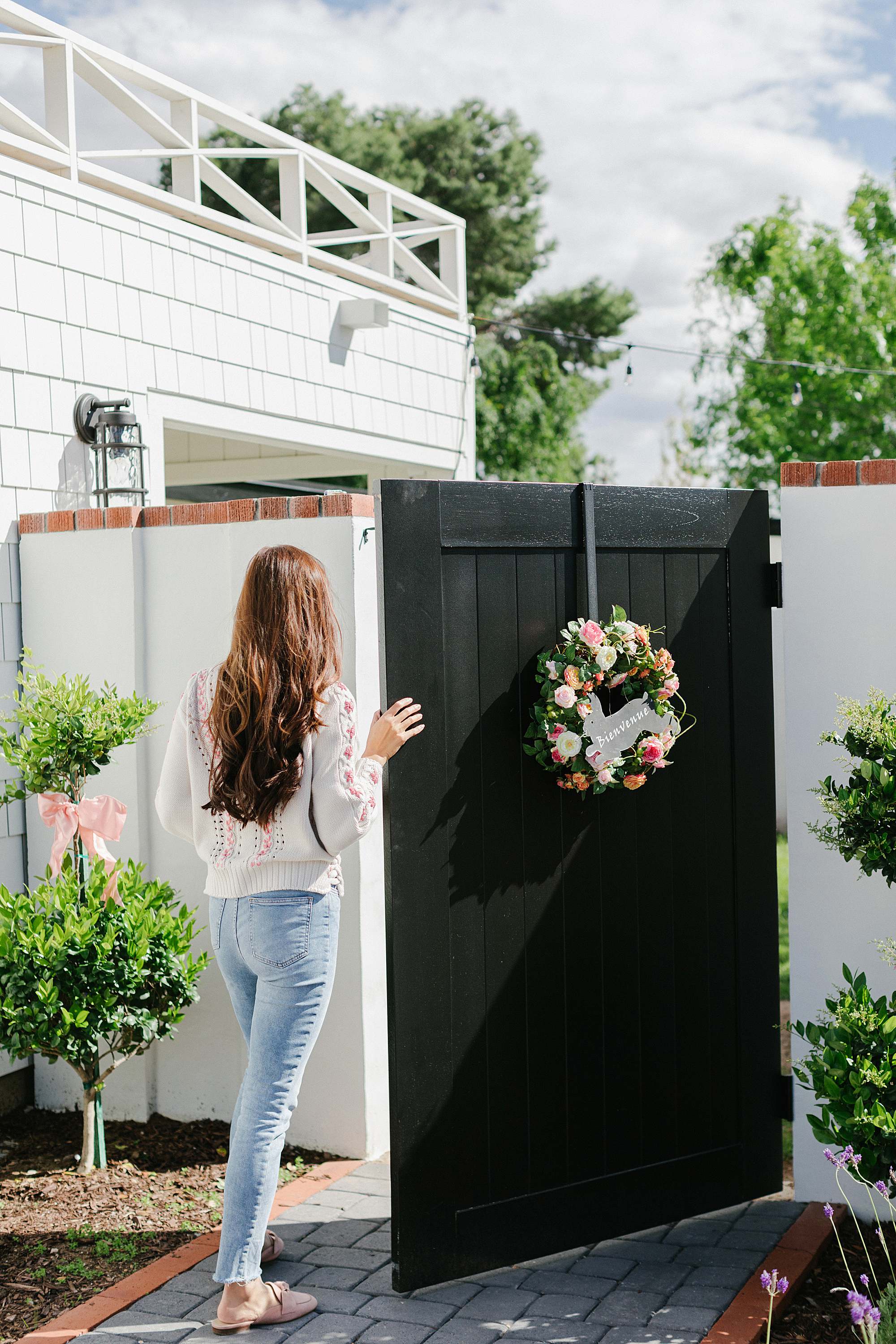 black side gate with floral spring wreath - arizona lifestyle blogger home and garden blog