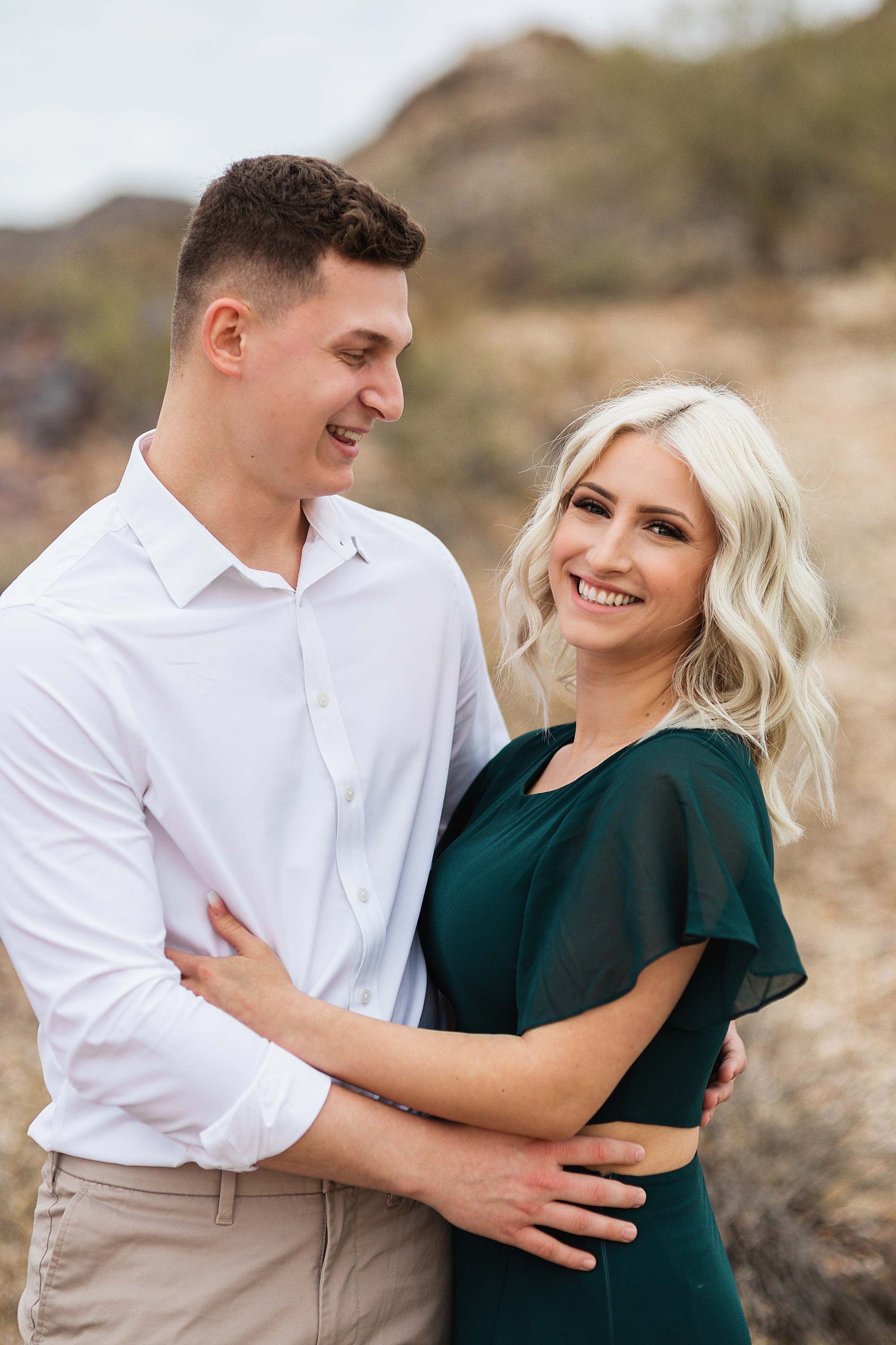 engagement session couple pose Phoenix Arizona engagement photographer green long dress engagement dress wardrobe idea