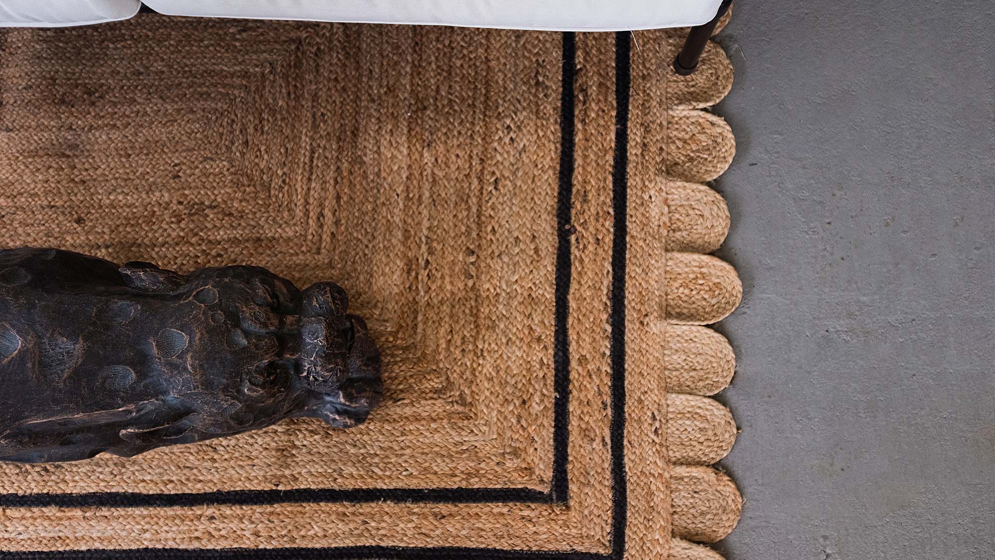 scalloped jute rug - leopard coffee table bench 