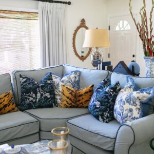 blue and white with tiger print living room blue couch pleated skirt pleats on skirt of couch
