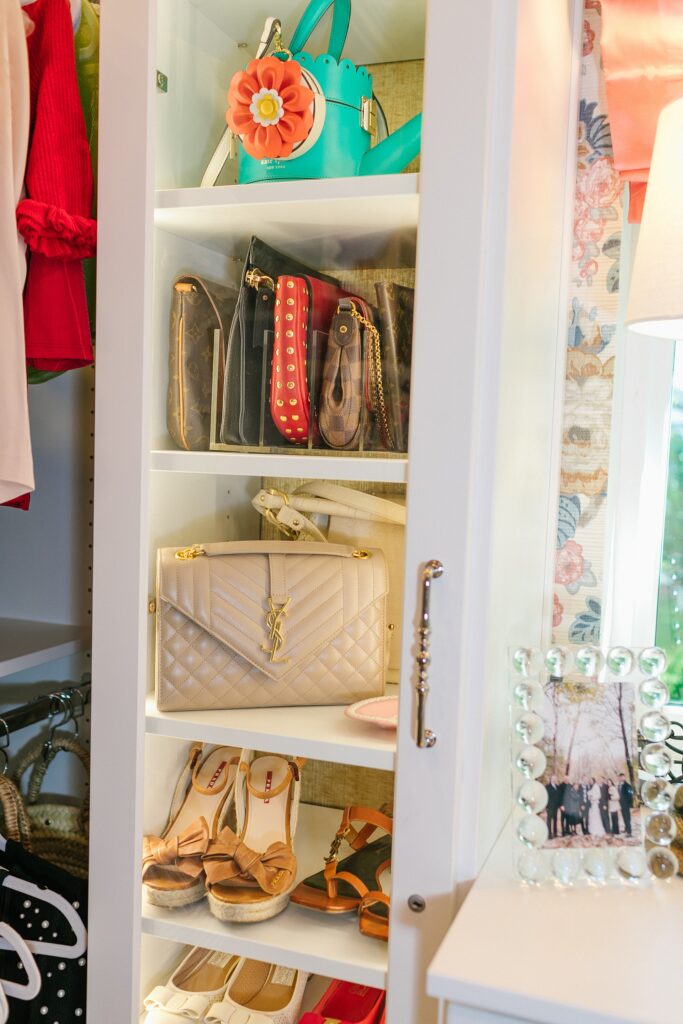 display purses and shoes behind LED cabinet lock // cabinet closet design ideas Closet design ideas. pink ceiling designer lee sofa wallpaper Lee Jofa Avondale grasscloth wallpaper and matching roman shade - a beautiful classy dressing room feminine, sophisticated, walk-in-closet idea.