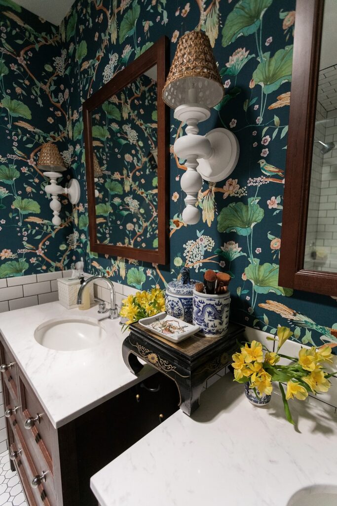 designing a bathroom with dark wallpaper vinyl two sinks moody look, rattan wall sconces