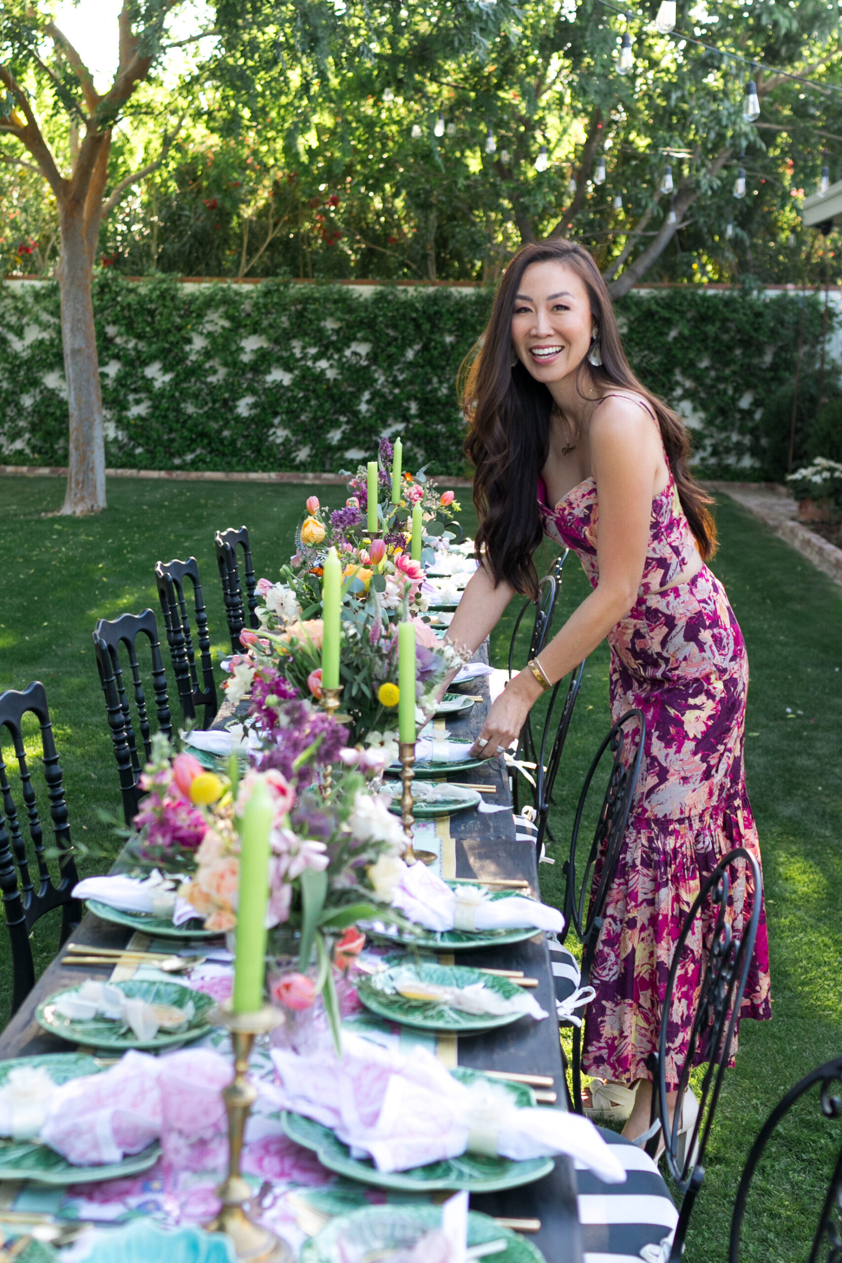 Diana Elizabeth Steffen setting the table for her annual garden party